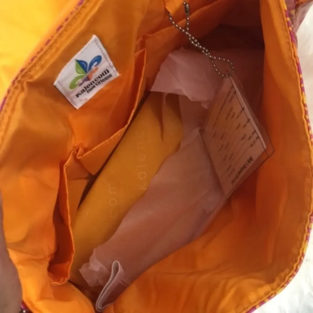 Kelencom Corp. New Orleans diaper orange bag AZO